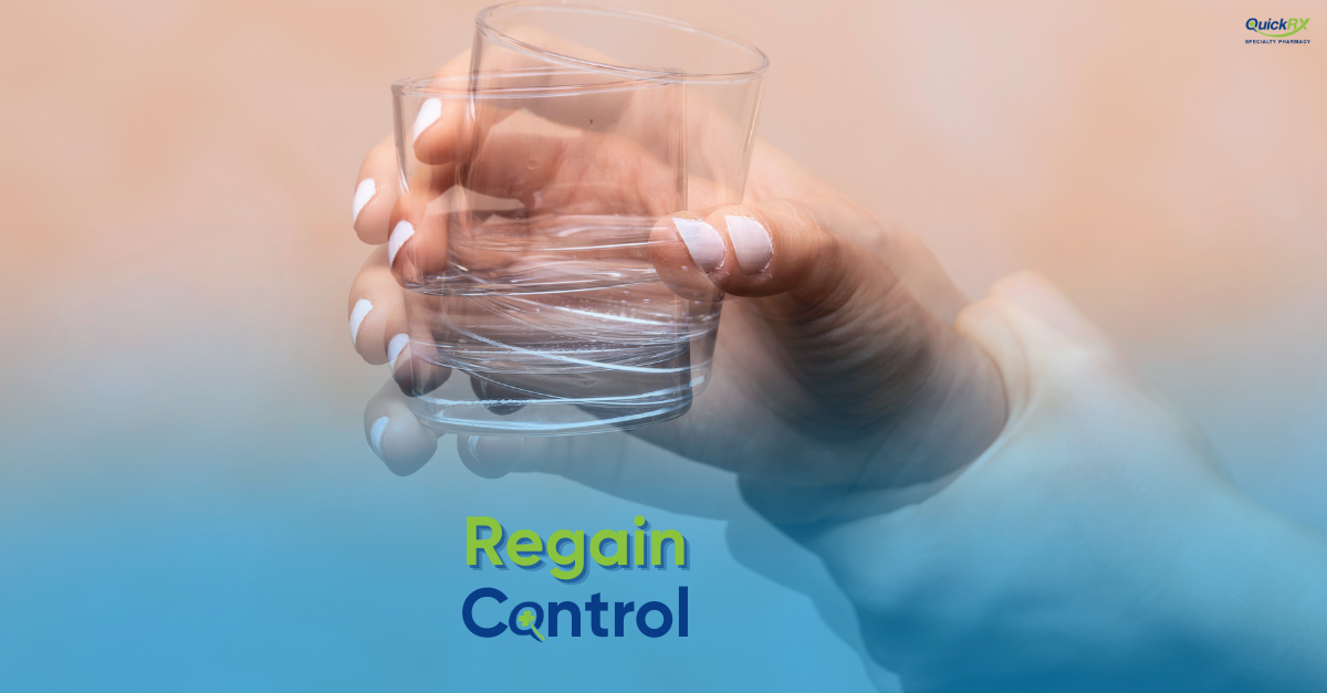 Shaking hand holding a glass, representing improved control of involuntary movements with Tetrabenazine.
