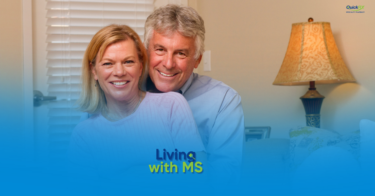 Smiling couple embracing at home, for a QuickRX Specialty Pharmacy guide to living with multiple sclerosis (MS)