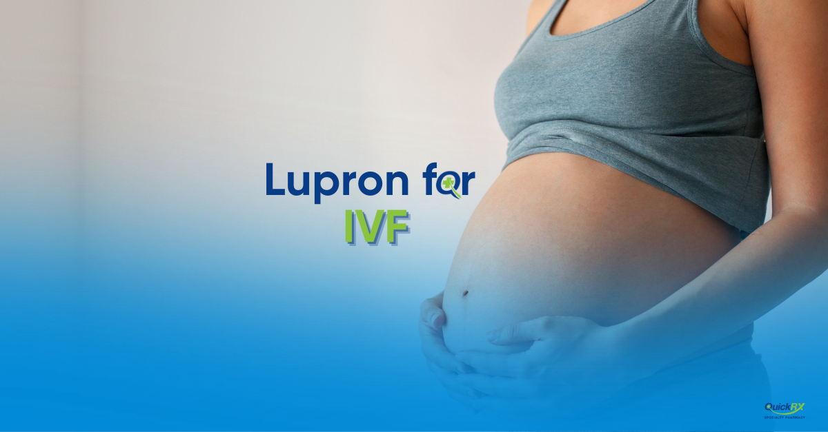 Close-up of a woman holding an IVF syringe near her belly