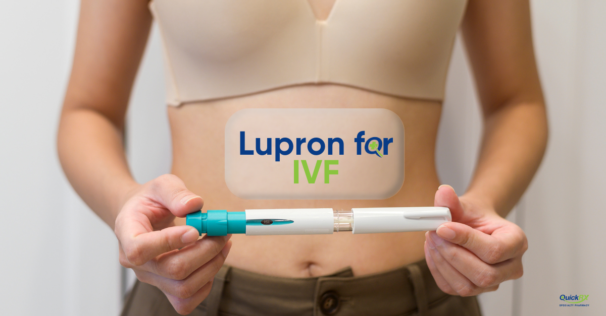 Close-up of a woman holding an IVF syringe near her belly