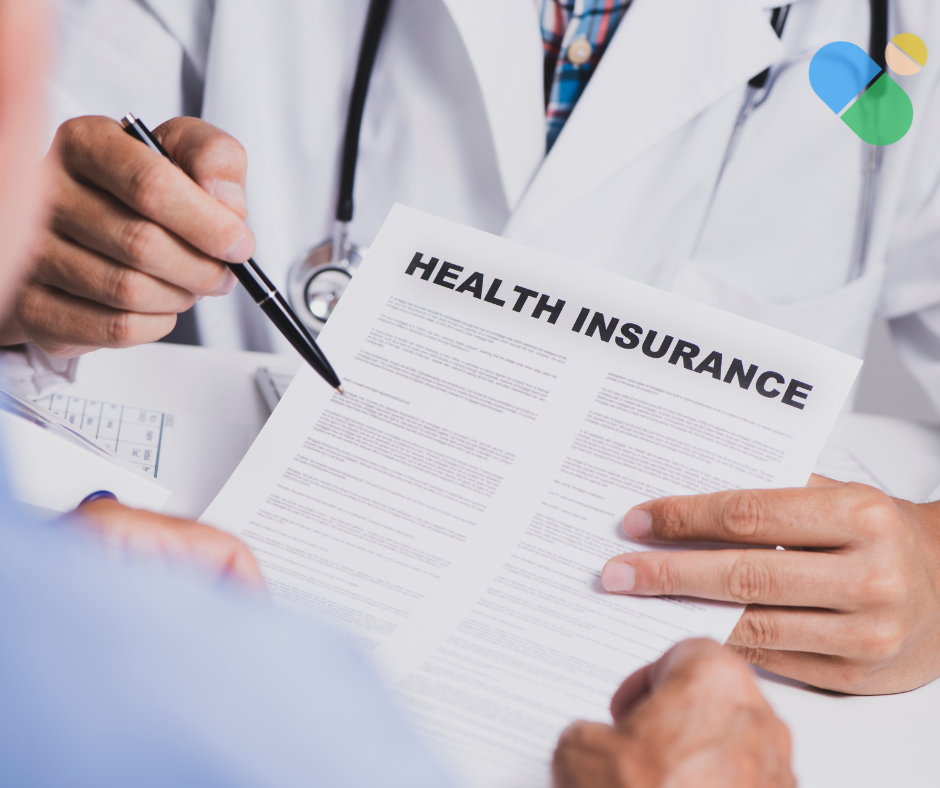 Healthcare provider reviewing health insurance documents with a patient, focusing on medication coverage details