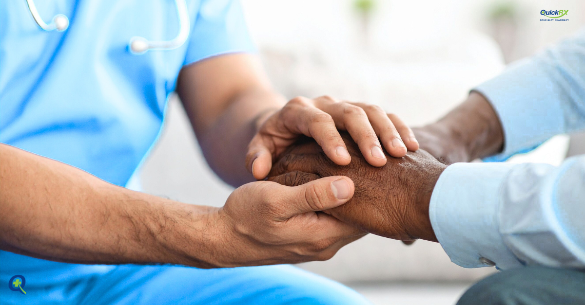 Healthcare professionals in blue scrubs holding hands with CKD patient showing compassionate care and support for Auryxia treatment