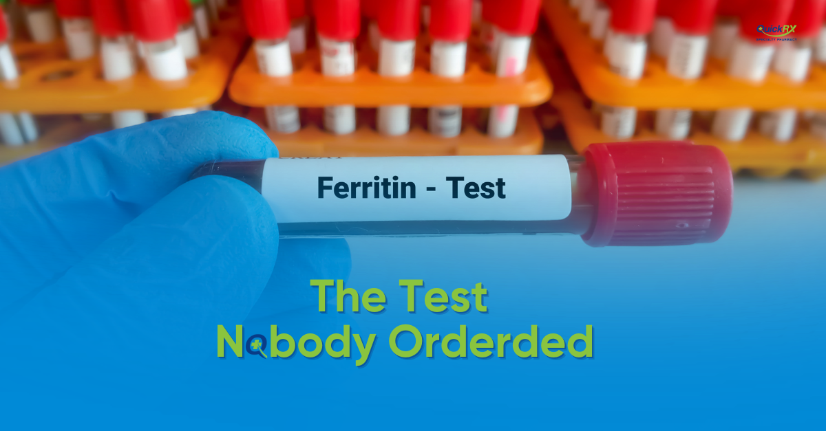 Gloved hand holding a blood collection tube labeled Ferritin Test in front of racks of specimen tubes